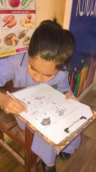 In the classroom at A.H.P School & College